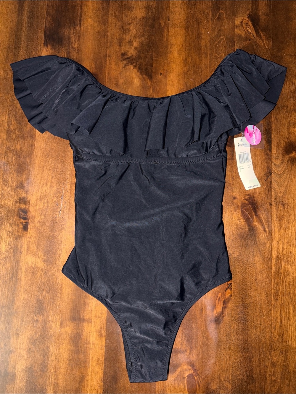 Raisins Women’s Black Off Shoulder Ruffle Cheeky Fit One Piece Swimsuit NWT S